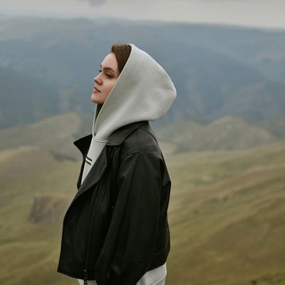 A calm landscape with misty mountains, symbolizing breathing.